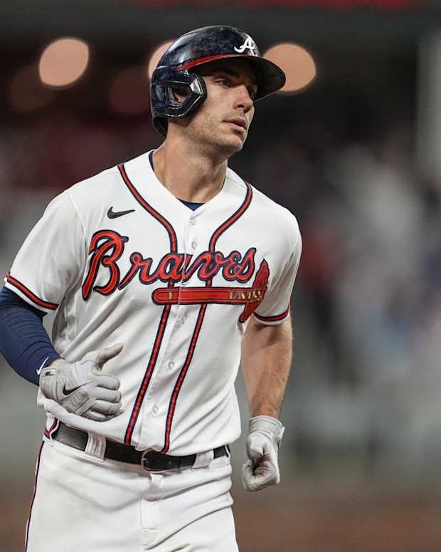 Oct 1, 2022; Cumberland, Georgia, USA; Atlanta Braves first baseman Matt Olson (28) runs after hitting a home run against the New York Mets during the sixth inning at Truist Park. Mandatory Credit: Dale Zanine-USA TODAY Sports